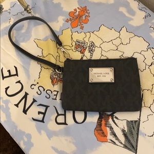 Michael Kors wristlet Sold